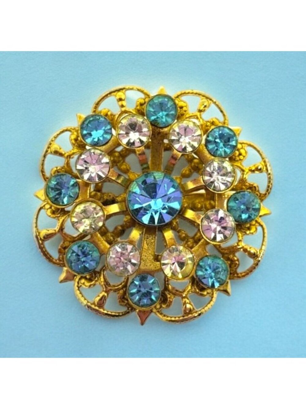 Vintage Brooch Pin Blue Clear Rhinestone Starburst 1-1/8" Gold Tone Flower